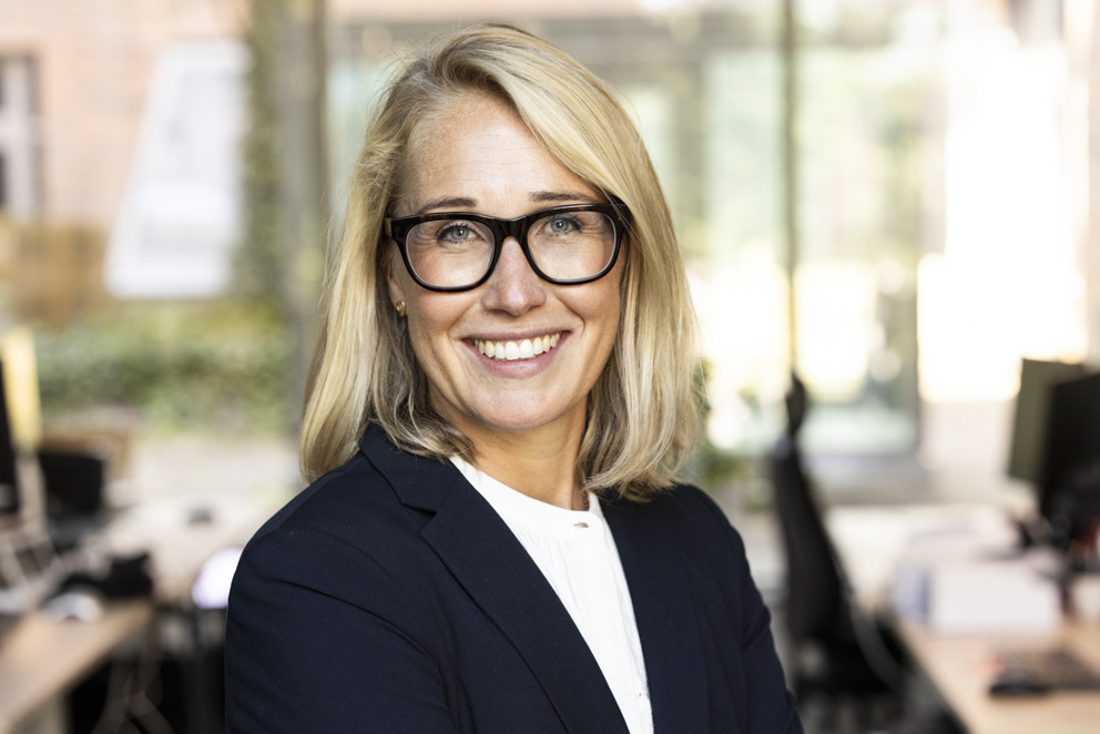 Portrait of a business woman with glasses smiling